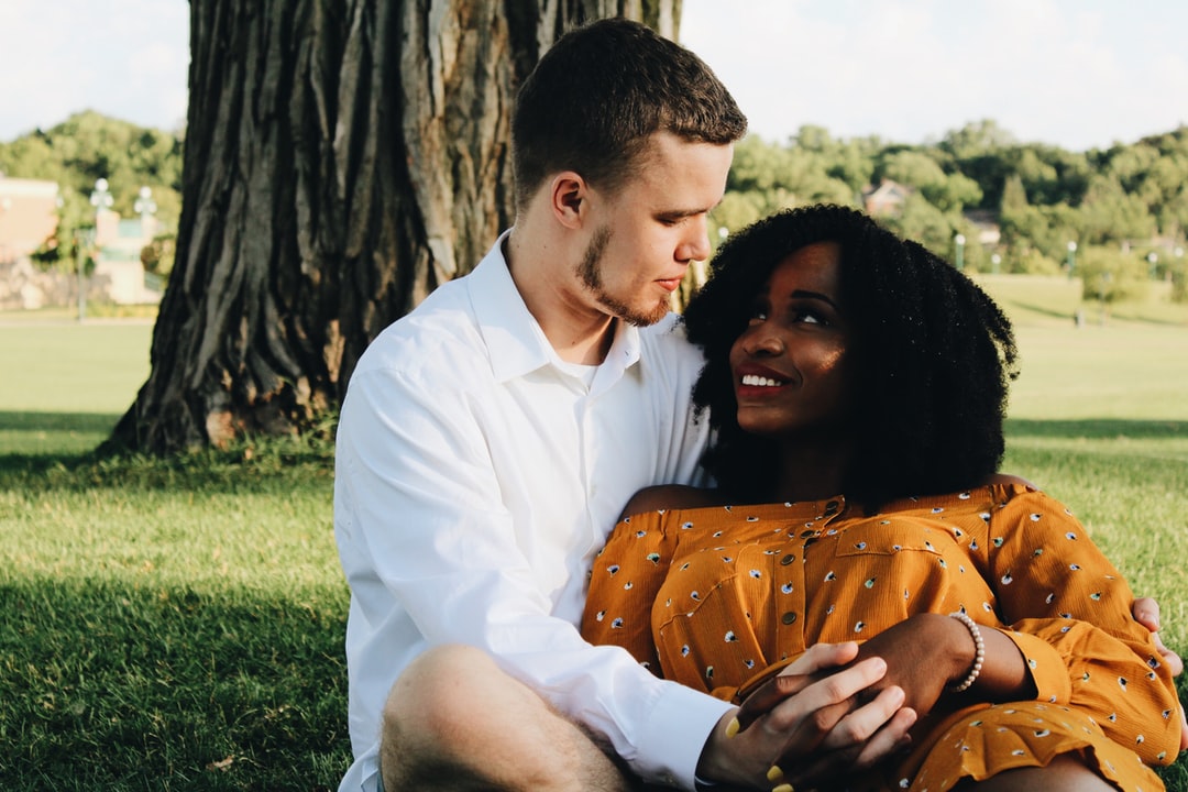 couple outdoors on ground